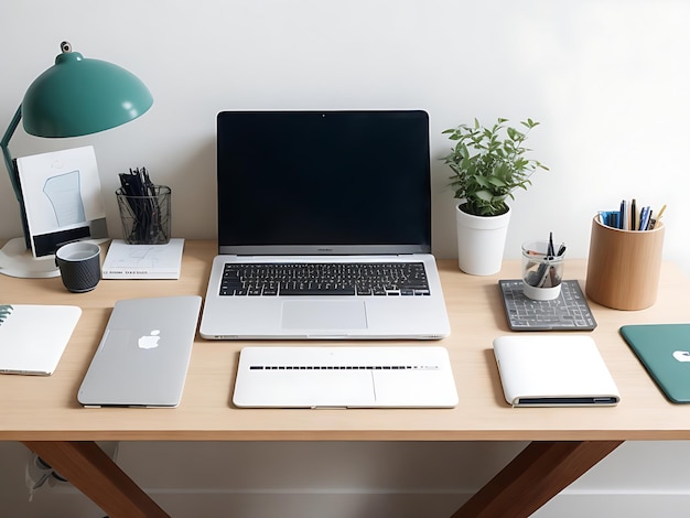 Desk Arrangement with Laptop and Notebooks