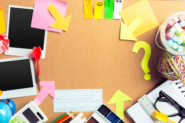 Desk of an artist with lots of stationery objects with copyspace