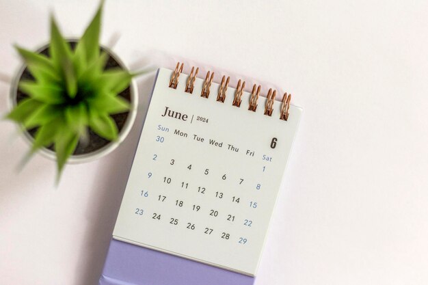 Photo desk calendar for june 2024 on a white background