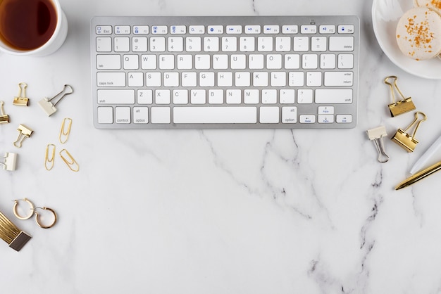 Photo desk items arrangement on marble table