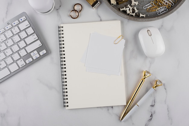 Photo desk items on marble table above view