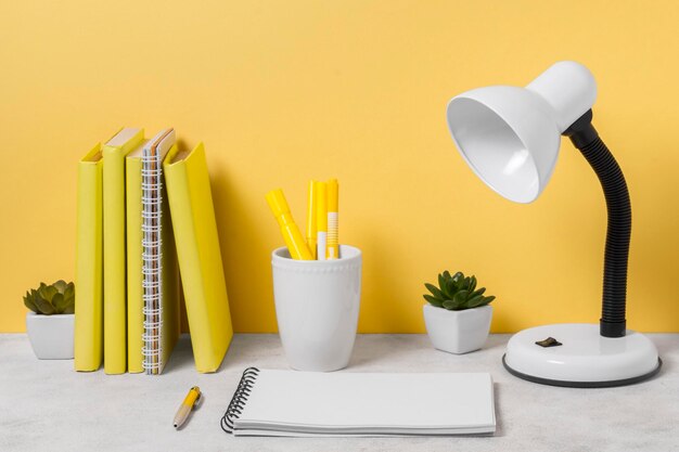 desk lamp notebook arrangement