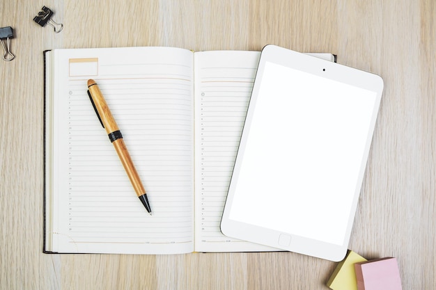 Desk top with empty notepad