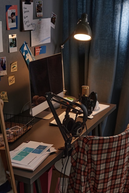 Desk with computer in the room