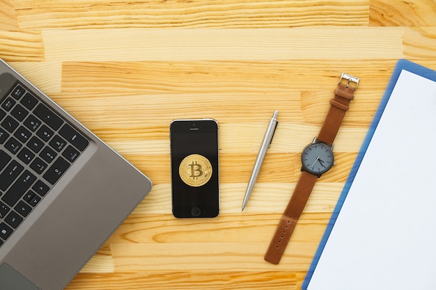 Desk with various gadgets and office supplies