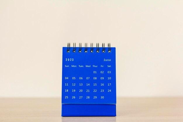 Desktop calendar for June 2023 on a light background