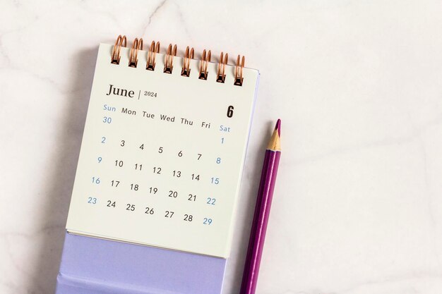 Photo desktop calendar for june on a light background