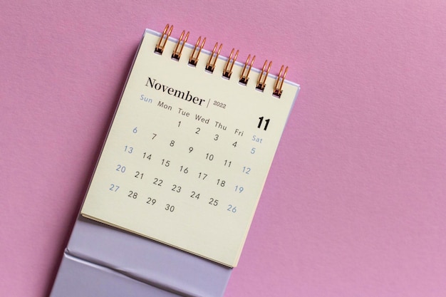 Desktop calendar for November 2022 on a lilac background