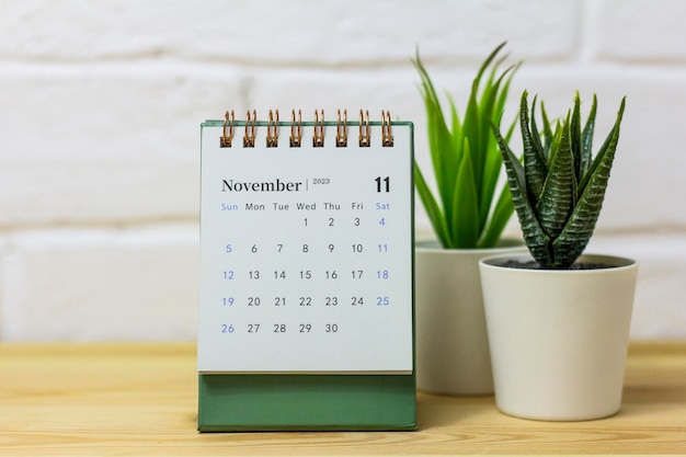 Desktop calendar for November 2023 on the tableCalendar for planning and management