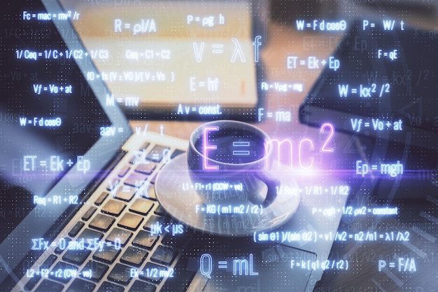 Photo desktop computer background and formula hologram writing double exposure education concept
