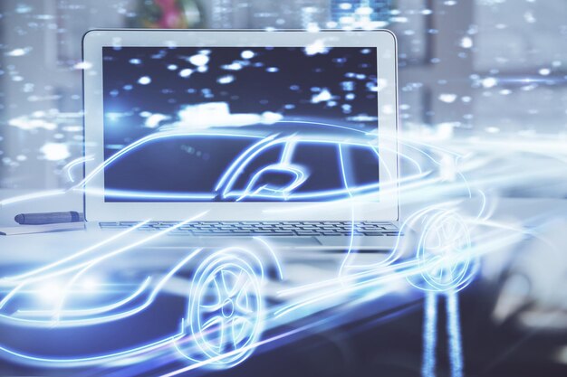 Desktop computer background in office with automobile hologram drawing Multi exposure Tech concept