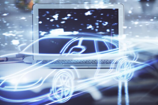 Desktop computer background in office with automobile hologram drawing Multi exposure Tech concept
