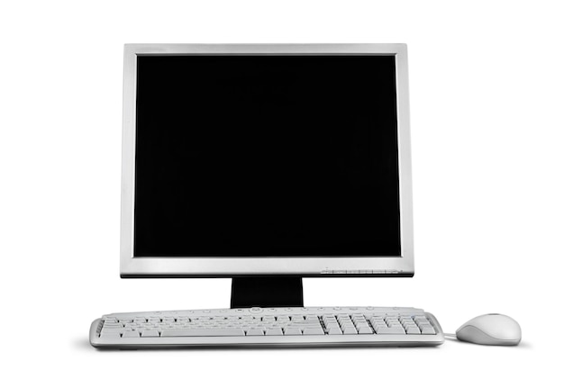 Desktop computer and keyboard and mouse on white