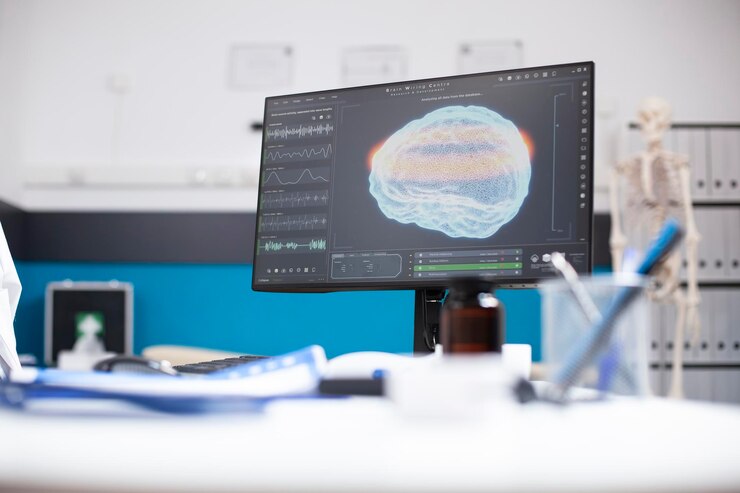Photo desktop monitor displaying brain imaging