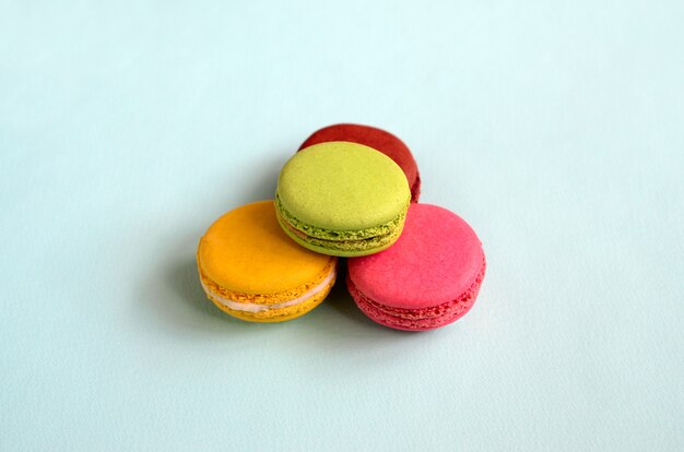 Dessert cake macaron or macaroon on trendy pastel blue 