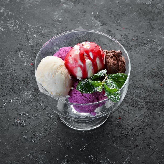 Dessert. Color ice cream with berry sauce. Top view. Free space for your text.