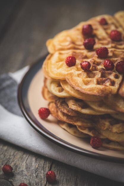 Dessert Homemade sweet and hot pancakes on a rustic table