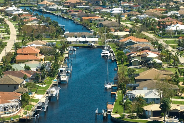 Destroyed by hurricane Ian suburban coastal houses in Florida home residential area Consequences of natural disaster