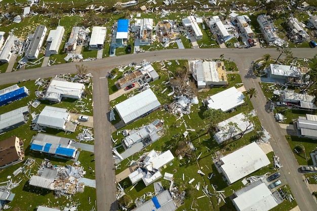 Destroyed by hurricane Ian suburban houses in Florida mobile home residential area Consequences of natural disaster