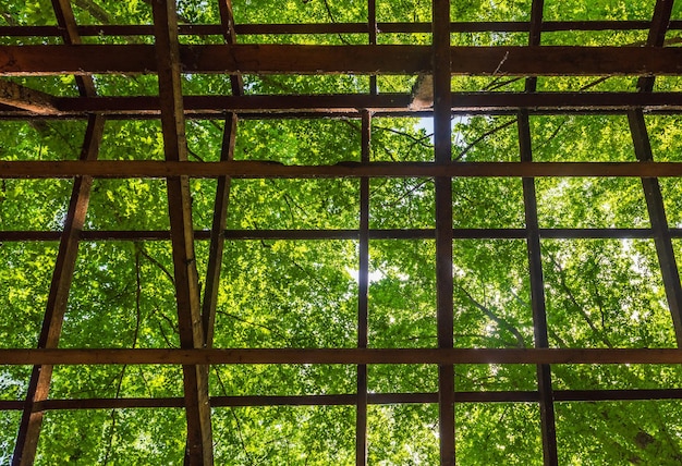 Destroyed roof of an old abandoned house