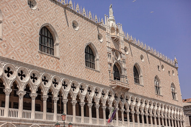 Detail of architecture of Ducal Palace in Venice during a sunny day