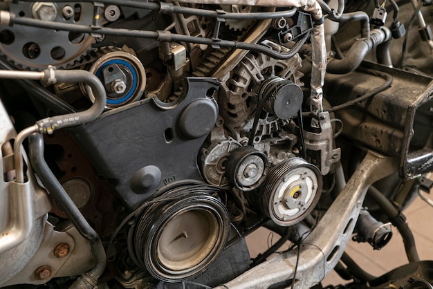 Detail of Broken belt in the car engine