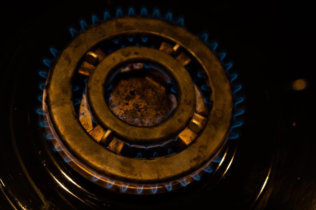 Detail of burning gas on the stove, rising gas prices