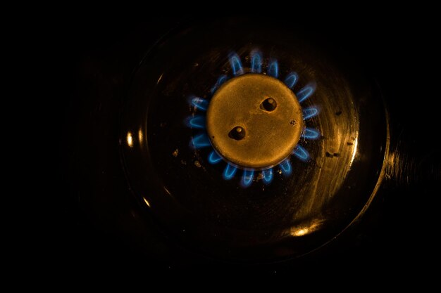 Detail of burning gas on the stove, rising gas prices