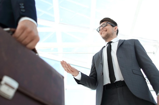 Detail of a businessman holding his briefcase