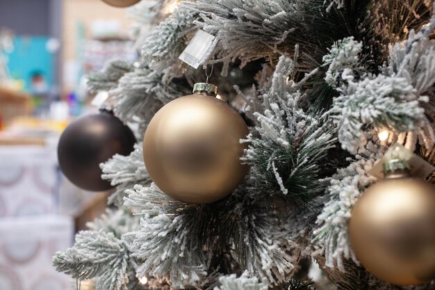 Detail of Christmas tree with decorative gold balls