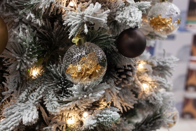 Detail of Christmas tree with decorative gold balls