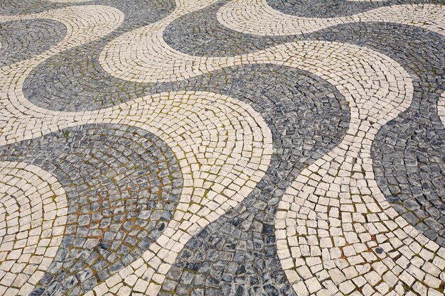 Detail of a cobblestone pavement - Lisbon, Portugal.