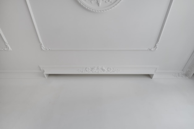 Photo detail of corner ceiling cornice with intricate crown molding