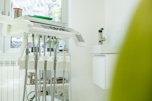 Detail of a dental tools attached to a dental chair in a dental clinic