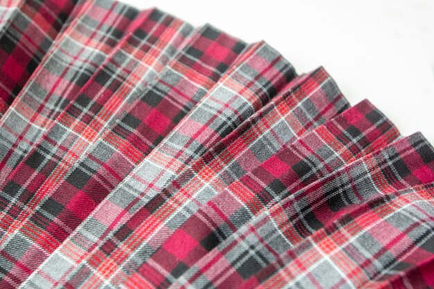 Detail of fashion plaid pleated skirt