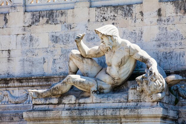 Detail of the fountain of the adriatic sea built on 1870 located at the altare della patria in rome