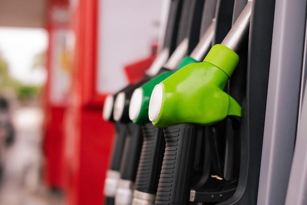 Detail of fuel pumps in european gas station inflation rising prices economy speculation concept