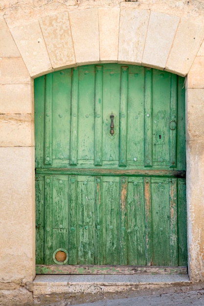 Detail on Green Wooden Door