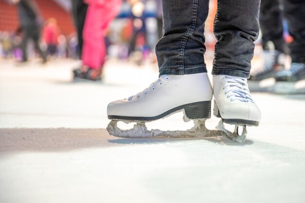 Detail of ice skating while skating on ice rink