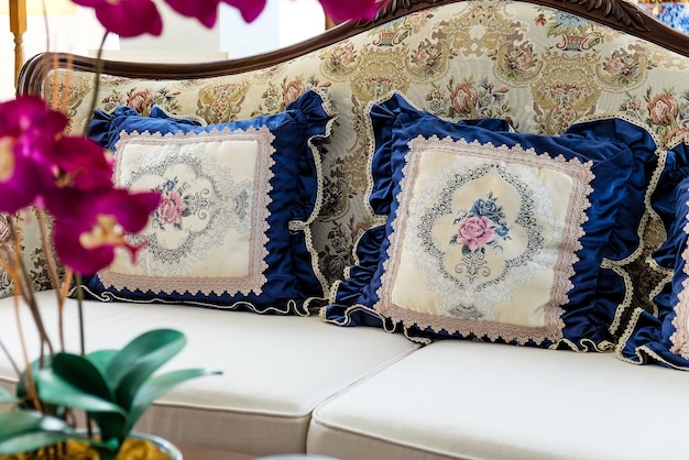 Photo detail image of pillows on an antique luxury sofa