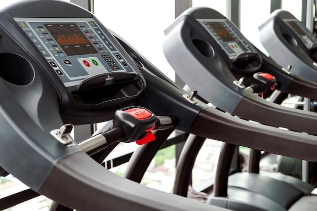 Photo detail image of treadmill in fitness room background