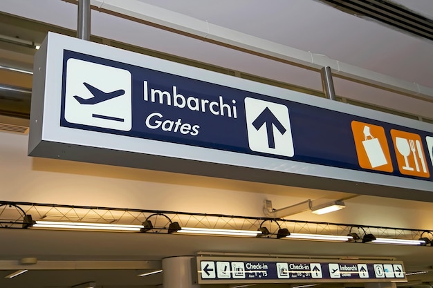 Photo detail of an italian airport gates sign