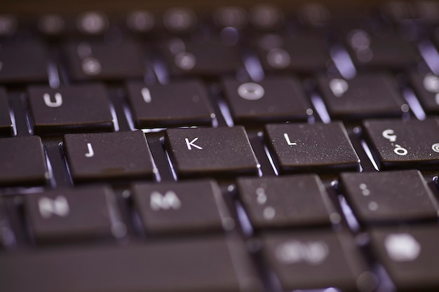 Detail of the letter keys on a laptop keyboard