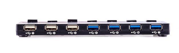 Photo detail of many usb ports on a computer port multiplier hub on white