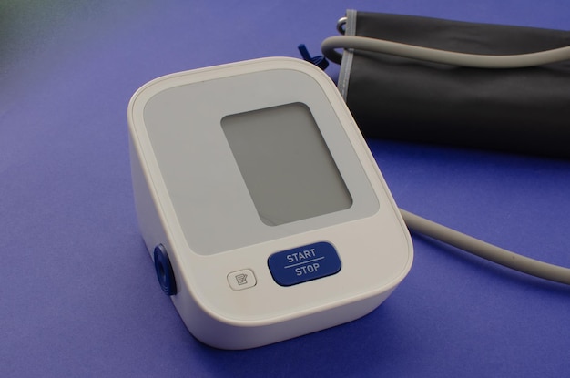 Detail of a modern blood pressure measuring device symbolizing the fusion between health and technological innovation Manometer incorporating health and technology concepts