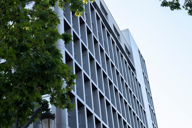 Detail of modern building in metal and vegetation