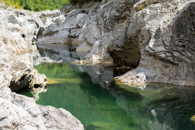 Detail of natural rough stone rippled rock background