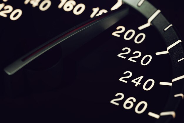 Detail of needle of odometer or speedometer of a car with high speed