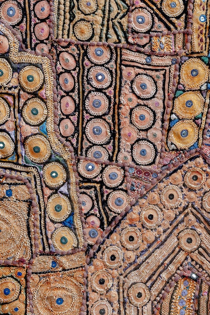 Detail old colorful patchwork carpet India Close up