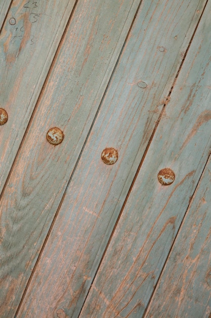 Detail op groene houten deur achtergrond